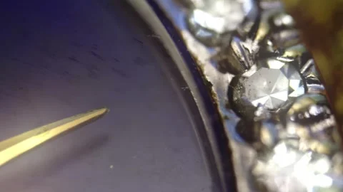 Macro view of luxury wristwatch dial with ornate diamond encrusted bezel an.. Stock Footage 337385194