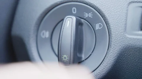 Macro view of male driver setting the air condition temperature in the car. 스톡 동영상 111931488