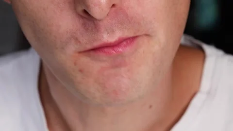 Macro view of man enjoying spaghetti, twirling pasta with fork and taking a.. Stock Footage 318902553