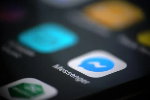 Macro view of Messenger app in a smartphone screen Stock Photos