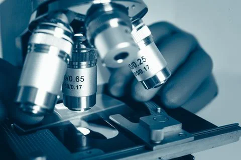 Macro view of microscope lens and slide Stock Photos