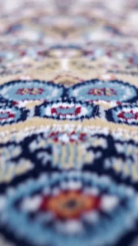 Macro view moving slowly over a traditional persian carpet, showcasing the Stock Footage 342942242