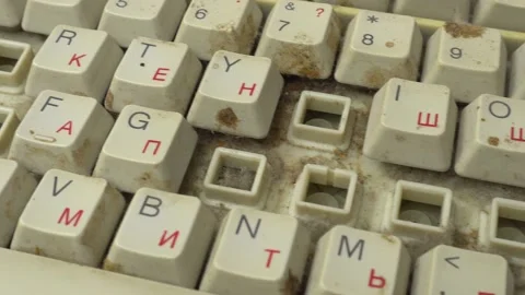 Macro view. Old computer keyboard with dirty buttons. Buttons with letters of Stock Footage 147569278