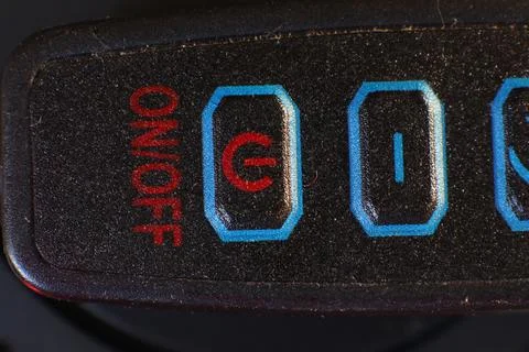Macro View of Power On Off Switch with Standby and Energy Icons Stock Photos