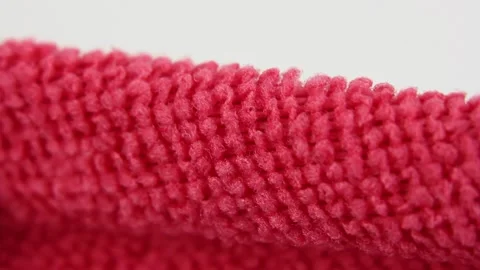Macro view on red microfiber dusting cloth, water absorbing synthetic fabric Stock-Footage 160053235