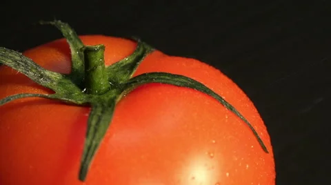 Macro View of Red Tomato with Water Splash Video stock 45430153