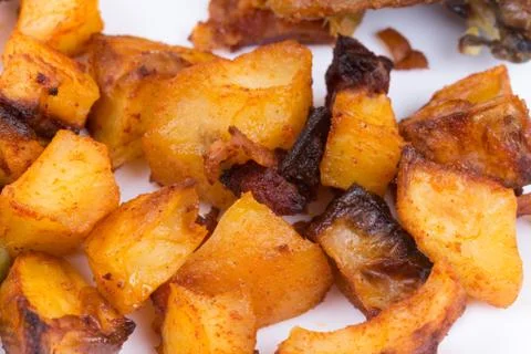 Macro view of roasted potatoes Stock Photos