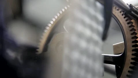 Macro View of Rotating Brass Clock Gears in Motion Stock Footage 345754383