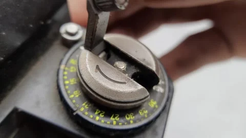 Macro View Rotating ISO Dial on Vintage Camera Video stock 310176621