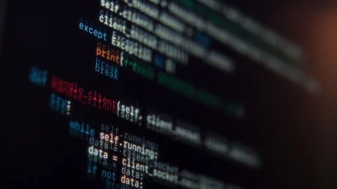 Macro view of a running programming script, with lines of code Video stock 296120391