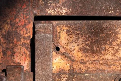 Macro view of rusted iron handle and hatch Stock Photos