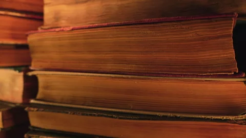 Macro View Of Saved Medieval Books With Ancient Writings. Religious Literature Stock Footage 332571389