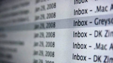 Macro view of scrolling through inbox emails on a computer screen Stock Footage 333484429