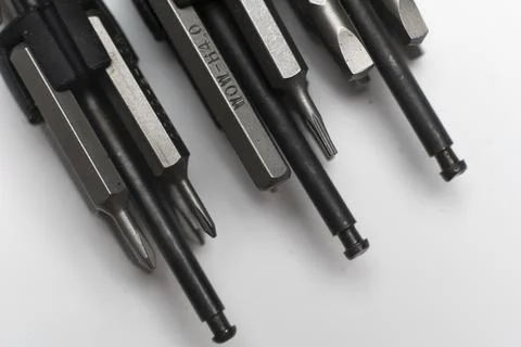 A macro view of set of silver screwdriver bits collection Stock Photos