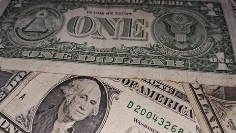 Macro view of several one dollar bills showing intricate details Stock Photos
