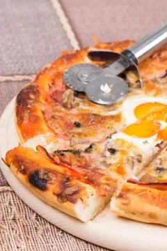 Macro view slice of pizza with ham and egg Stock Photos