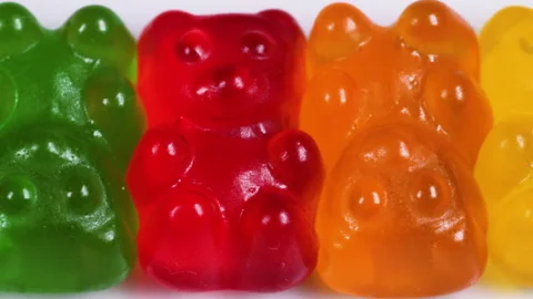 Macro view slider shot of colorful gummy bear shaped candies.candy background Stock Footage 170627408