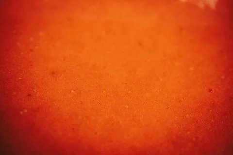 Macro view of smooth orange-red strawberry. Stock Photos