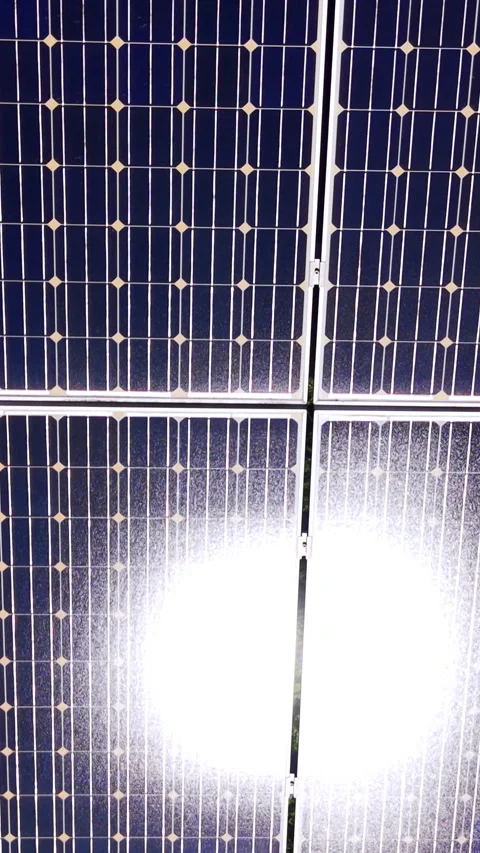 Macro view of solar panel cells with sunlight glare Vertical video. 스톡 동영상 338008136