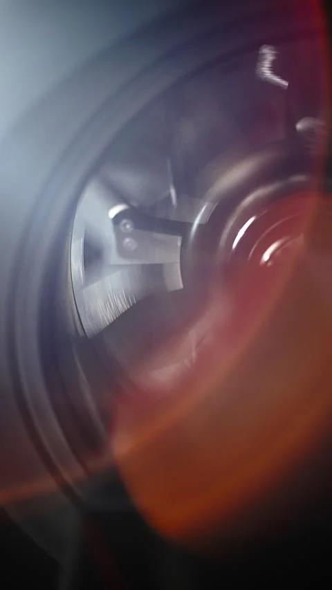 Macro view of a spinning centrifugal compressor turbine impeller inside its Vídeo Stock 334181671