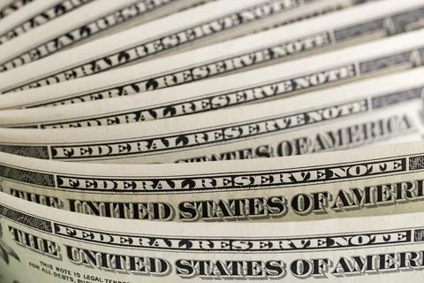Macro View of Stacked One US Dollar Bills with Focus on George Washington P.. Stock Photos
