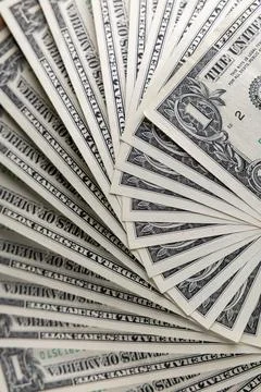 Macro View of Stacked One US Dollar Bills with Focus on George Washington P.. Stock Photos