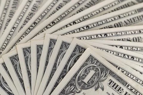 Macro View of Stacked One US Dollar Bills with Focus on George Washington P.. Stock Photos