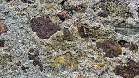 Macro view of stone wall, highlighting unique textures and patterns Stock Photos