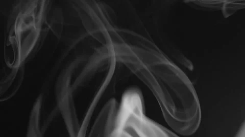 Macro View of Swirling Incense Smoke Forming Abstract Shapes on Dark Background Stock Footage 339755833