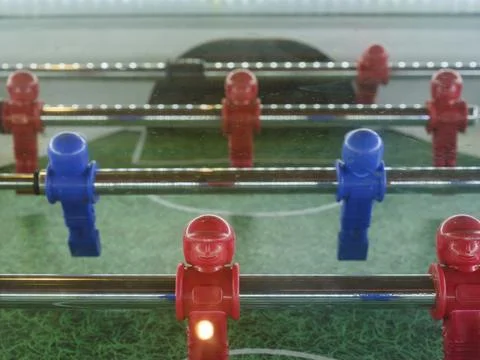 Macro view of a tabletop foosball game Stock Photos