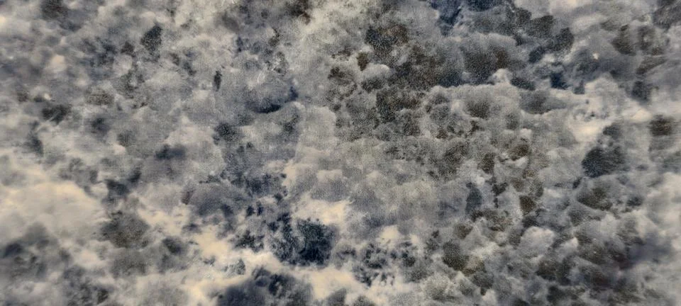 Macro view of a textured surface resembling mottled stone Foto stock