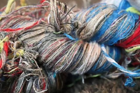 Macro view of tiny interwoven strings on a dog toy rope Stock Photos