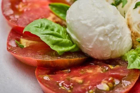 Macro view tomatoes, basil and mozzarella cheese Foto stock