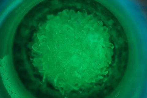 Macro view of a translucent crystal-like cluster illuminated. Foto stock