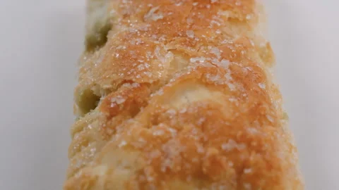 Macro view of a Turkish dessert made of crispy layers of puff pastry Stock Footage 297015174