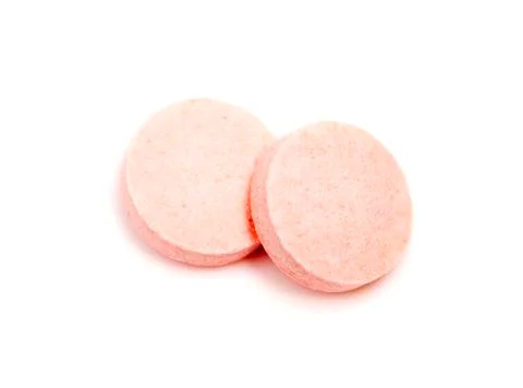 Macro View of Two Light Pink Pills Stock Photos