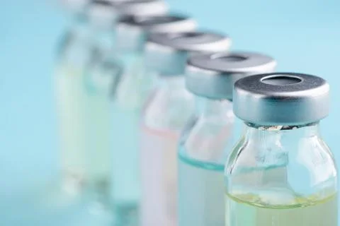 Macro view on vials. Different color of liquid medicine Foto stock