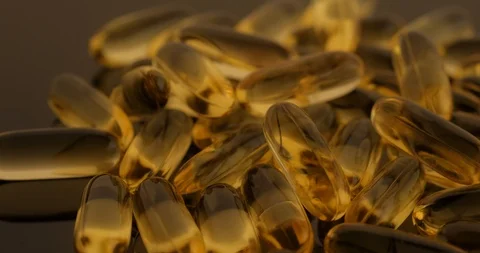 Macro view: Vitamins supplements pills omega 3. Fish oil capsules. 4k. 50fps Stockbeeldmateriaal 108101538