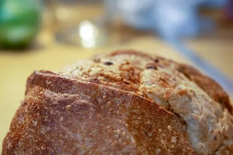 Macro view of the wheat round bread surface with sprouted grains Stock Photos