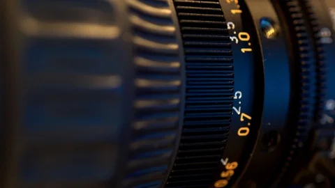 A macro view of a working camera lens.	 Stock Footage 109235135