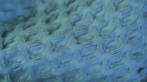 Macro of the Waffle Wicker Cotton Texture of the Blue Plaid Fabric of the Bedspr Stock Footage 136179037