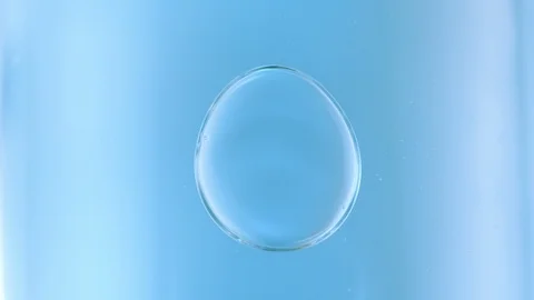 Macro Water Bubble in blue background in slow motion Stock Footage 92765731
