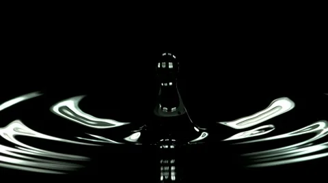 Macro Of Water Droplet Falling In Black Water In Super Slow Motion 2000 Fps 스톡 동영상 62954796