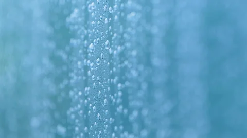 Macro Water Droplets On Blue Surface In Slow Motion Stock Footage 345846223