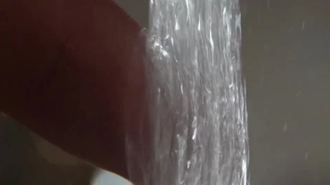Macro Water Flow Touching With Finger 스톡 동영상 233353246