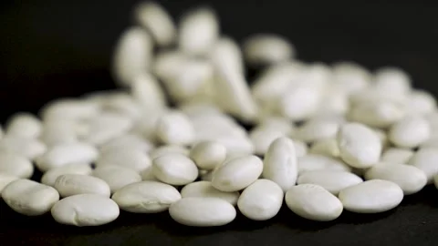 Macro white beans with heavy bokeh background 4k 10bit 120fps Видео 332723800