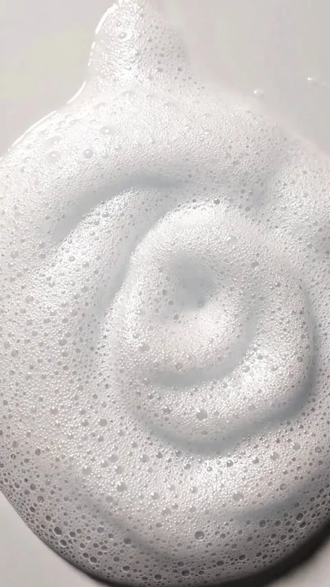 Macro White Foam Soap Bubbles and Skincare Cleanser Texture Stock Footage 342194331