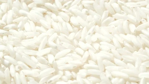Macro white raw rice texture, food background, vegetarian healthy eating product Vídeo Stock 141781594