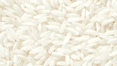 Macro white raw rice texture, food background, vegetarian healthy eating product Stock Footage 142050505