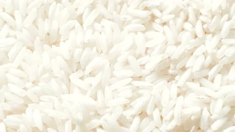Macro white raw rice texture, food background, vegetarian healthy eating product Vídeos de archivo 144232653